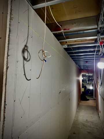 New walls lining the hallway inside Fresh Pops as construction moves forward.